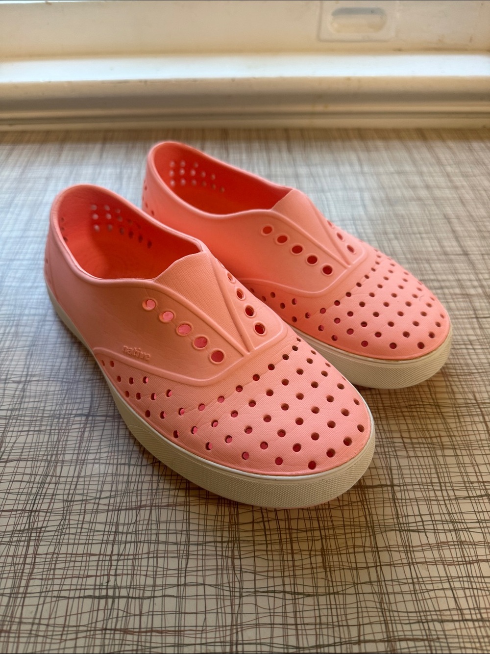 Native Women's Jefferson Slip-On Sneakers in Coral Pink
